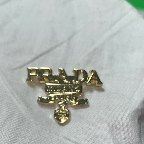 Prada Shiny Gold Emblem Pin